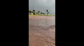 Car Swallowed by Floodwaters and Police Rush to Rescue Family; Video Captures Moment of Desperation