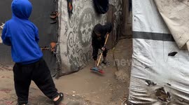 Heavy rains flood dozens of tents sheltering displaced Palestinians in southern Gaza