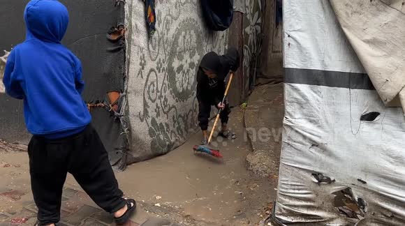 Heavy rains flood dozens of tents sheltering displaced Palestinians in ...