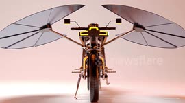 UNCAPTIONED: World's first self-charging motorcycle uses dragonfly-style panels to generate its own power
