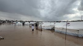 Displaced Palestinians’ tents flooded by severe rainfall in Gaza