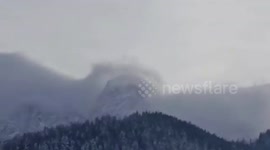 Fast-moving clouds over the mountains in Zakopane, Poland