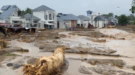 Flash floods hit luxury housing in Padang, killing four people.