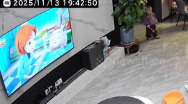 Toddler hammer damage to television in Henan, China