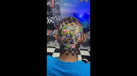 Fluorescent hair art showcases creative designs in Aguaí, Brazil