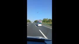 Motorist Stuns Drivers with Towering 