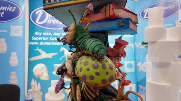 Amazing rotating Alice in Wonderland cake showing at the Ideal Home Show At Christmas