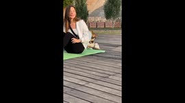 Morning Yoga Turns into Chaos as Playful Stray Dog Steals Woman's Mat and Shoes