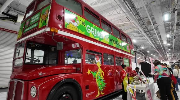 A fun The Grinch inspired tea and cake bus at this years Ideal Home Show At Christmas