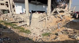 Palestinians observe Friday prayer atop rubble of al-Albani Mosque in Khan Younis
