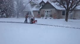US: Man Battles Fresh Overnight Snow With Powerful Snowblower