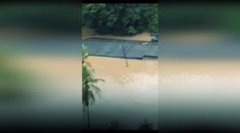 Sri Lanka: Man Rescued From Coconut Tree As Sri Lanka Air Force Bell 212 Saves Flood Victim