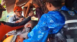 Indonesian Search And Rescue Team Evacuate Elders Hit By Massive Flood In Mandailing Natal, North Sumatera, Indonesia