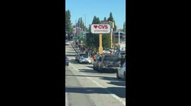 US: Massive Line Forms Outside Ham Store Ahead of Thanksgiving in Los Angeles