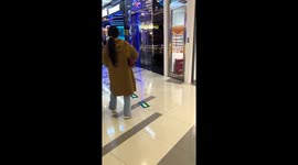 Energetic robotic dinosaur toy entertains in Shanghai, China