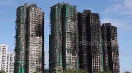 Hong Kong begins 3 days of mourning after deadly fire kills 128, with 200 missing