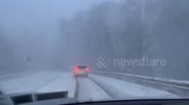 Heavy lake-effect snow reduces visibility in Marcellus, New York, USA