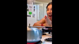 Green ball floats on pressure cooker steam in a Florida, USA