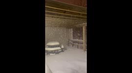 Heavy snowfall blankets roads and landscape in Beachwood, USA