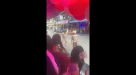 Two tourists fight in front of bar girls in Pattaya
