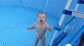 Kid has fun filling pool - RAW