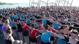 More than 400 ballerinas break world record for largest stand 'en pointe'