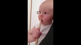 Baby reacts to clean shaved dad