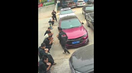 Hilarious railing collapse surprises men during lunch in Henan, China