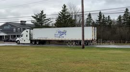 Truck Drags Concrete Barrier
