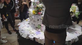 Hong Kongers set up impromptu altar to offer condolences and words of encouragement to those affected by Tai Po fire