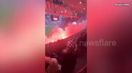 Video captured moment fireworks and flares set off at Amsterdam football stadium