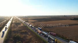 Greek farmers halt traffic on Athens-Thessaloniki highway with tractor protest
