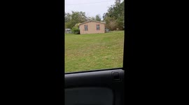Passerby Checks On Friend Laying By Roadside