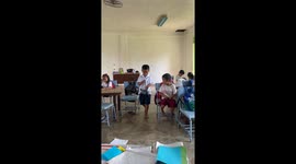 Student Gives His Teacher a Mud Crab
