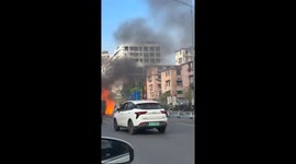 Fire damages vehicles at subway station exit in China