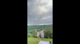 Excited dad accidentally sprays wife in the face during gender reveal