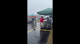 Heavy rain delays fans before the game in Miami, Florida, USA