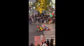 Heroic man in wheelchair comes to aid of go-kart drivers stuck on Tokyo's Shibuya crossing