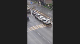 Bizarre Sight: Driver Navigates Busy Traffic with Car Door Wide Open in Russia