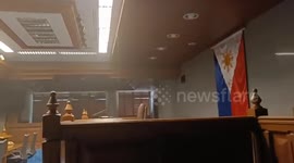 Water leak and smoke fill session hall as fire breaks out at the Philippine Senate building