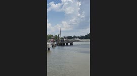 Construction crane collides with bridge structure in Savannah harbor