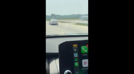 Motorist captures car driving with tire iron stuck in wheel on Chicago highway