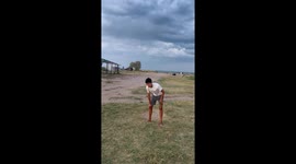 Gymnast's backflip attempt ends in painful faceplant on grass in Kazakhstan