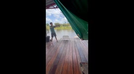 Hammock swing goes wrong sending boy flying into river in hilarious Brazil clip