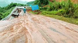 Mountain road ravaged by landslide in Vietnam