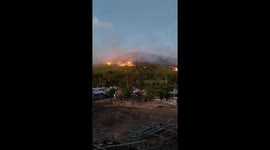 Rapidly spreading grass fire in Palumbanes Islands, Catanduanes, Philippines