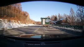 Debris from moving truck shatters car windshield in Jilin, China