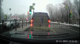 Police car struck during left turn at busy intersection in St. Petersburg, Russia