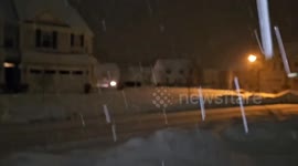 Deep morning snowfall blankets neighborhood in Aurora, Ohio, USA