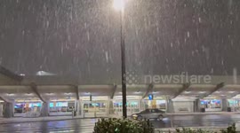 Visibility reduced as snowstorm batters airport in Washington